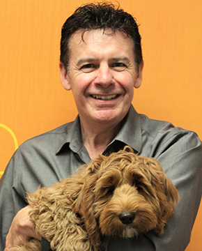 Neil Gill Holding Puppy