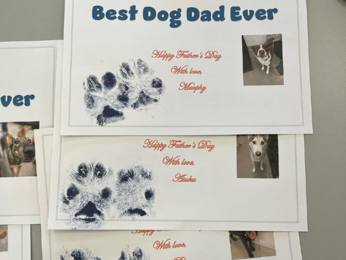 a collection of Father's Day paw art