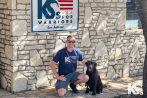 Wounded bedroom paired with service dog.