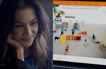 Woman watching dogs playing at Dogtopia of Liberty Village daycare through the webcam.