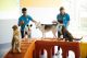 Dog behavior experts train four dogs at Dogtopia of Viera daycare.