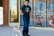 Dogtopia workers walking a dog