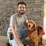 Adam at Dogtopia of Rocklin and their dog.