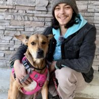 Dillon, Canine Coach at Dogtopia of Rocklin and their dog.