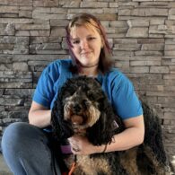 Emry at Dogtopia of Rocklin and their dog.