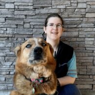 Kathyrn, Canine Coach Trainer at Dogtopia of Rocklin and their dog.