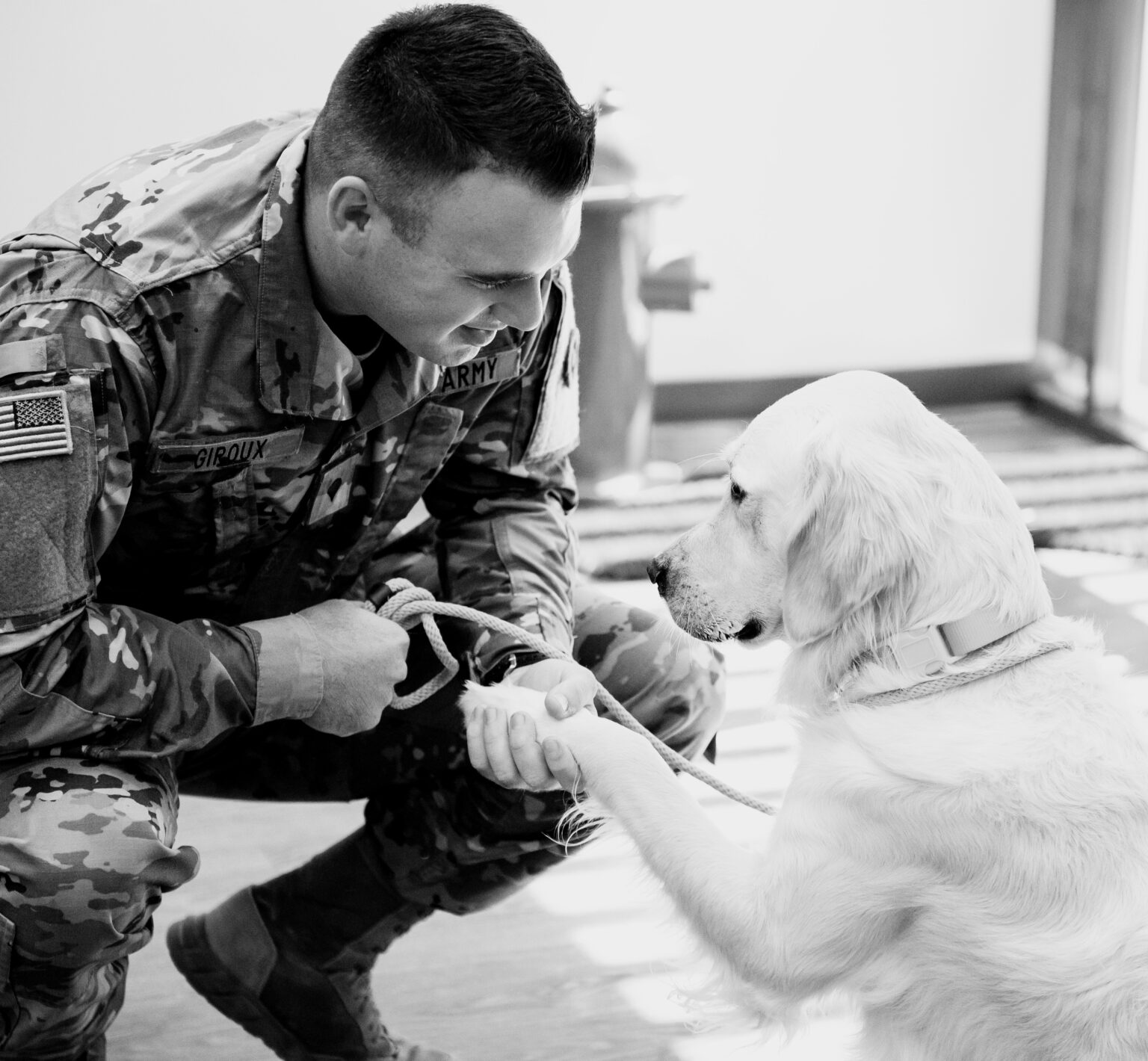 Veteran with a Dogtopia Foundation service dog providing support and companionship.