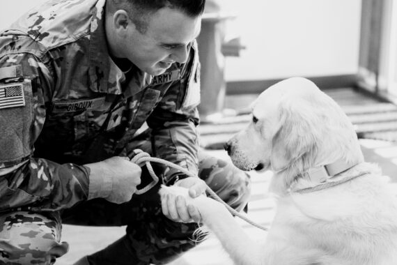 Veteran with a Dogtopia Foundation service dog providing support and companionship.