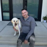 Craig Seiden, Owner of Dogtopia of Downtown Orlando, with a dog