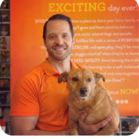 Owner of the store Nick Losciuto holding his dog proudly