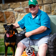 Ronnie Howell of Dogtopia of Denton with dogs